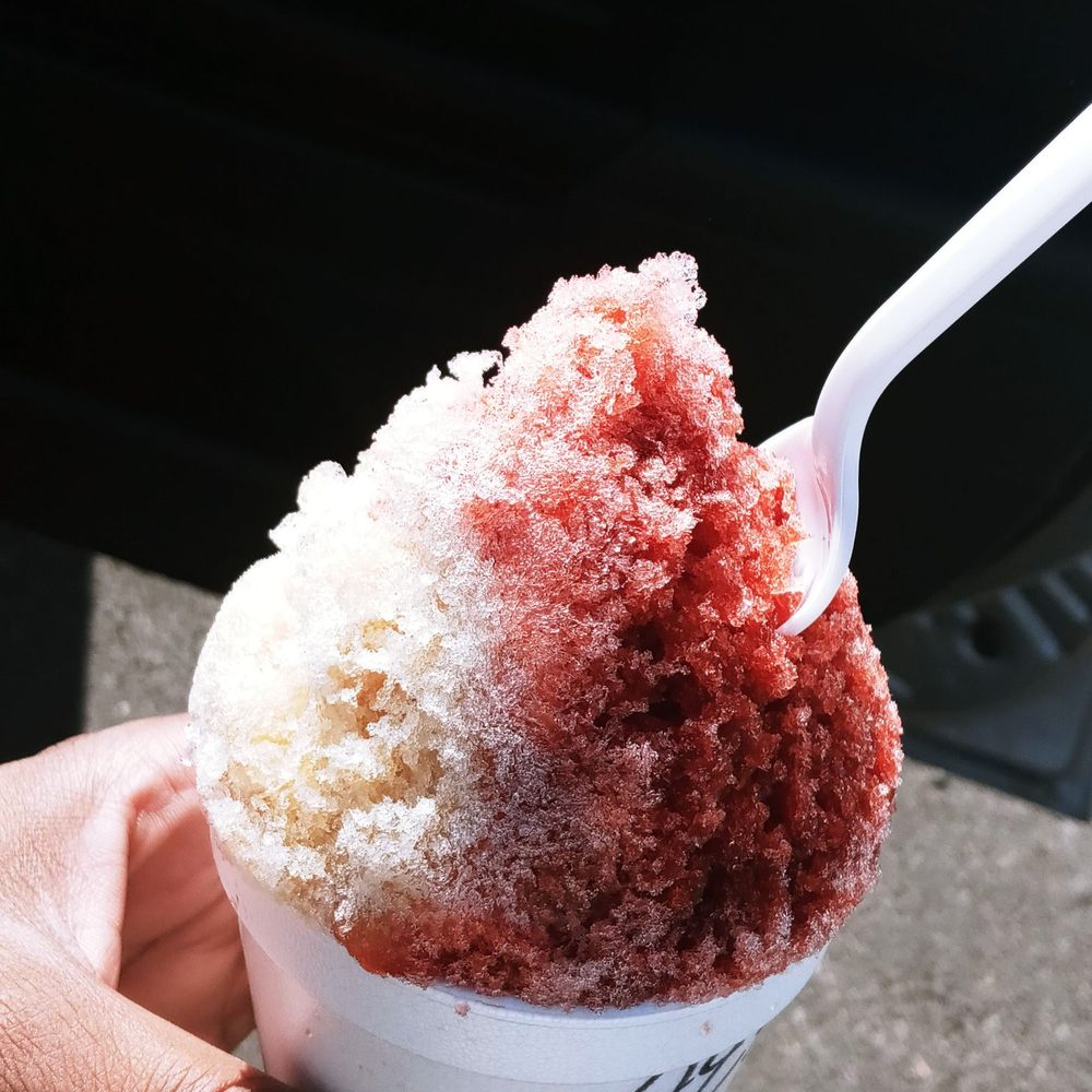 Snow Vegas Shave Ice - a hand holding a cup of ice cream - Shaved Ice Near Me - Henderson, Nevada Snow Vegas Shave Ice - a hand holding a cup of ice cream - Shaved Ice Near Me - Henderson, Nevada