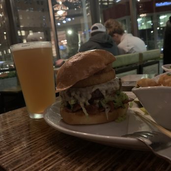 Relish Burger Bistro - Bacon & Egg with no egg and an onion ring. - New American Near Me - Seattle, Washington Relish Burger Bistro - Bacon & Egg with no egg and an onion ring. - New American Near Me - Seattle, Washington