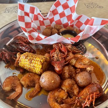 Pier 8 Cajun Seafood - Shrimp and crawfish lunch special with hush puppies - Seafood Near Me - Arvada, Colorado Pier 8 Cajun Seafood - Shrimp and crawfish lunch special with hush puppies - Seafood Near Me - Arvada, Colorado