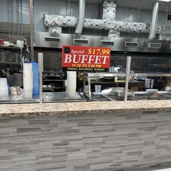 Apna Bazaar Restaurant - a buffet counter with a buffet sign - Indian Near Me - Franklin Township, New Jersey Apna Bazaar Restaurant - a buffet counter with a buffet sign - Indian Near Me - Franklin Township, New Jersey