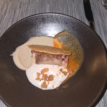 Partage - Octopus and A5 Japanese Wagyu. The lighter color at the 6 o'clock position was masa espuma that was to die for!! - French Near Me - Las Vegas, Nevada