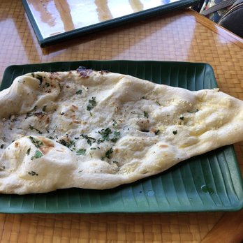 Himalayan Kitchen - Garlic Naan - excellent!! Ask to have it sliced for sharing! - Indian Near Me - Honolulu, Hawaii Himalayan Kitchen - Garlic Naan - excellent!! Ask to have it sliced for sharing! - Indian Near Me - Honolulu, Hawaii