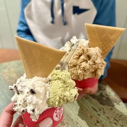 Two smalls: cookies and cream and pistachio, cookies and cream and salted caramel Two smalls: cookies and cream and pistachio, cookies and cream and salted caramel