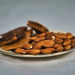 Mrs. J’s Heav’nly Delights - Almond Toffee 5oz container