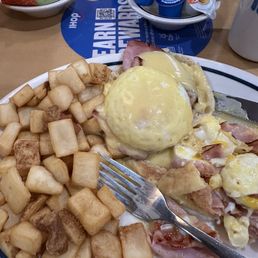 Classic Eggs Benedict potatoes fruit bowl Classic Eggs Benedict potatoes fruit bowl
