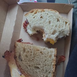 Dunkin' - Freshly prepared sour dough BEC with exta bacon. Hubby couldn't wait