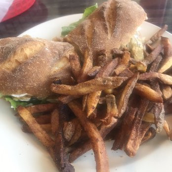 Vertical Diner - TBLT + A on a GF baguette with overcooked fries. - Vegan Near Me - Portland, Oregon Vertical Diner - TBLT + A on a GF baguette with overcooked fries. - Vegan Near Me - Portland, Oregon
