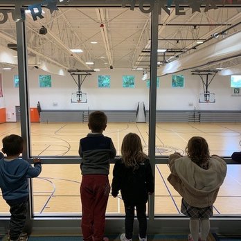 L.E.A.P. Childcare - The view from above! Friends looking at our HUGE gym area where we get to play when we can't get outside. - Child Care & Day Care Near Me - Woburn, Massachusetts L.E.A.P. Childcare - The view from above! Friends looking at our HUGE gym area where we get to play when we can't get outside. - Child Care & Day Care Near Me - Woburn, Massachusetts