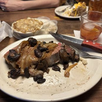 Texas Roadhouse - Prime rib topped with mushrooms and onions and loaded mashed potatoes with gravy - Steakhouses Near Me - Austin, Texas Texas Roadhouse - Prime rib topped with mushrooms and onions and loaded mashed potatoes with gravy - Steakhouses Near Me - Austin, Texas
