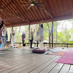 Houston Yoga & Ayurveda Ashram - Morning yoga on spacious outdoor patio