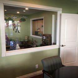 Newman Law Group - Meeting room with an opening to a kid playroom so that the kids are entertained!!