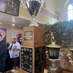 Cubs Den At Ballpark Synagogue - Championship trophies on display at the team store