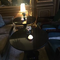 The dark, uncomfortable, poorly configured seating in the bar.  Not the place for a private conversation for two.