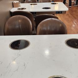 Heng Ji - Tables for hot pot, which they started serving this month (November)