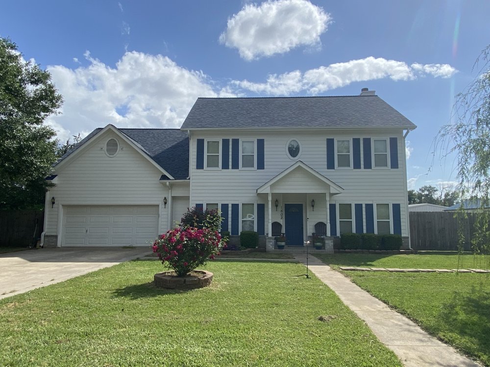 Slide of Big Randys Roofing