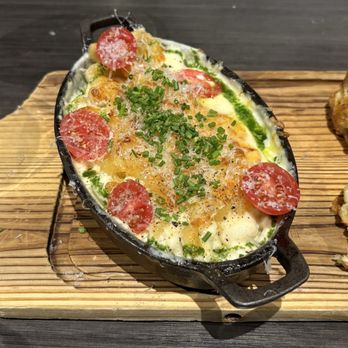 Bar Bistro - Six cheese macaroni and cheese baked in cast iron. - Cocktail Bars Near Me - Tacoma, Washington