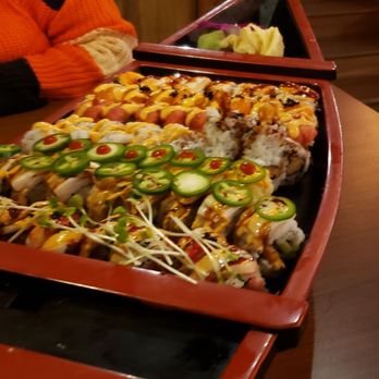 Bash Original Izakaya - The Sushi Boat: Tiger, BASH Signature, Lion, Ruby, King Salmon, Spicy Tuna, Godzilla Roll. - Sushi Bars Near Me - Detroit, Michigan Bash Original Izakaya - The Sushi Boat: Tiger, BASH Signature, Lion, Ruby, King Salmon, Spicy Tuna, Godzilla Roll. - Sushi Bars Near Me - Detroit, Michigan