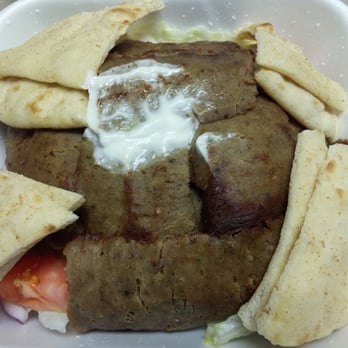 Troy Mediterranean Cuisine - Gyro salad. Yes there is lettuce, tomato, and red onion under all that meat - Mediterranean Near Me - Valley Park, Missouri Troy Mediterranean Cuisine - Gyro salad. Yes there is lettuce, tomato, and red onion under all that meat - Mediterranean Near Me - Valley Park, Missouri