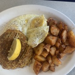 Royal Casino Restaurant - Salmon patties with fried egg and home fries
