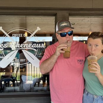 Les Cheneaux Coffee Roasters - My daughter and I posing in front for a silly picture with our favorite iced coffees. - Coffee Roasteries Near Me - Cedarville, Michigan Les Cheneaux Coffee Roasters - My daughter and I posing in front for a silly picture with our favorite iced coffees. - Coffee Roasteries Near Me - Cedarville, Michigan