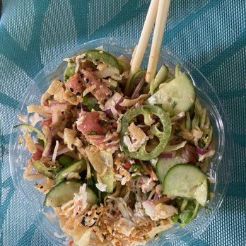 LA Poke & Sushi - Brown rice, tuna, jalapeños, cilantro, red onion, zucchini, crab meat, sesame seeds, cucumbers drizzled with spicy and eel sauce - Sushi Bars Near Me - Mandeville, Louisiana