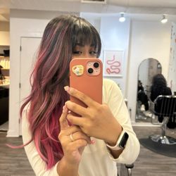 Pink hair touch up by Daphne