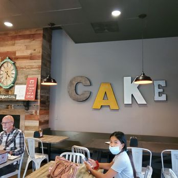 Wanna Cupcake? Bakery Cafe - Tables - Bakeries Near Me - Puyallup, Washington Wanna Cupcake? Bakery Cafe - Tables - Bakeries Near Me - Puyallup, Washington