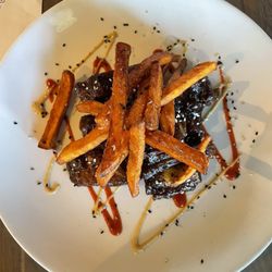 Bluewater Lounge - Wok Seared Pork Ribs  Mango Chili BBQ Sauce, Sweet Potato Fries