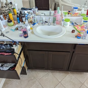 Heroes Household Services - Messy bathroom counter before - Home Cleaning Near Me Heroes Household Services - Messy bathroom counter before - Home Cleaning Near Me