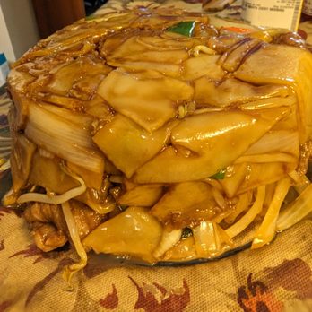 Hunan Diamond - Beef Chow Fun flipped over onto a glass plate. - Chinese Near Me - Columbia, Maryland Hunan Diamond - Beef Chow Fun flipped over onto a glass plate. - Chinese Near Me - Columbia, Maryland