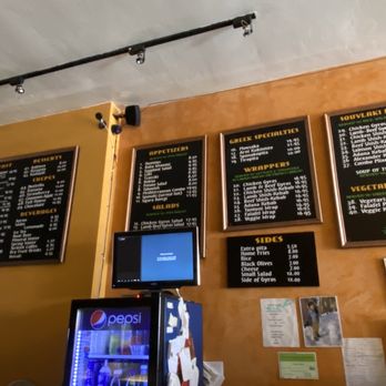Cafe Nur - menus on the wall above a vending machine - Mediterranean Near Me - Los Altos, California