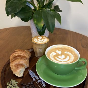 Leaf & Latte - a cup of coffee and a croissant - Coffee & Tea Near Me - Auburn Hills, Michigan Leaf & Latte - a cup of coffee and a croissant - Coffee & Tea Near Me - Auburn Hills, Michigan