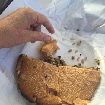 Fertitta's Delicatessen - This was the large Muffuletta. I think they should rename it the Gargantuan!! - Delis Near Me - Shreveport, Louisiana Fertitta's Delicatessen - This was the large Muffuletta. I think they should rename it the Gargantuan!! - Delis Near Me - Shreveport, Louisiana