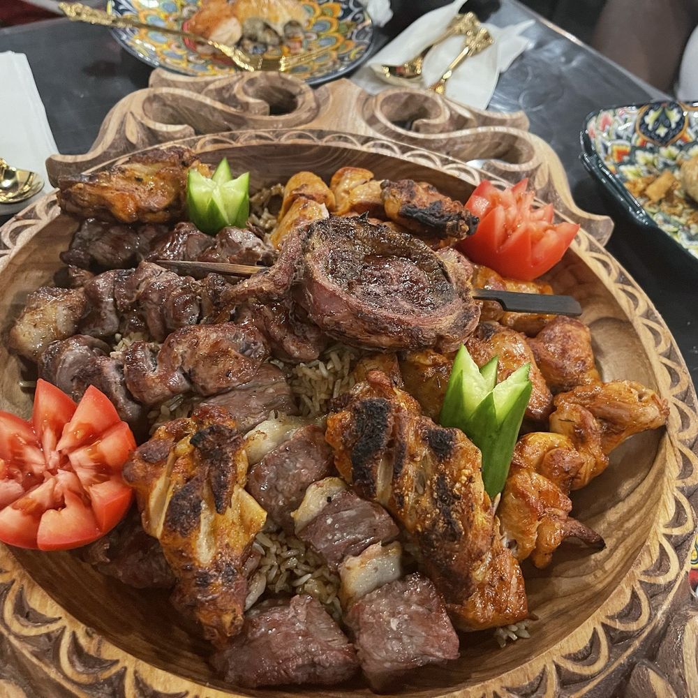 Meat platter... Filet Mignon, Chicken Wings, Beef, Chicken, Tomatoes, Cucumbers and Rice(at the bottom). Meat platter... Filet Mignon, Chicken Wings, Beef, Chicken, Tomatoes, Cucumbers and Rice(at the bottom).