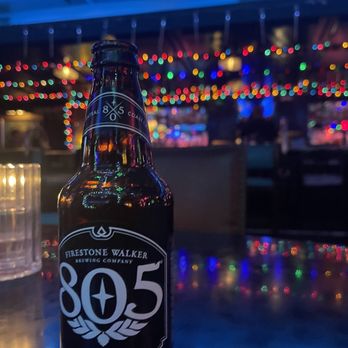 The Blue Room - a bottle of beer on a table - Lounges Near Me - Burbank, California The Blue Room - a bottle of beer on a table - Lounges Near Me - Burbank, California