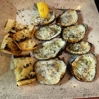 Mudbugs Cajun Kitchen - Grilled Parmesan Oysters with garlic bread! - Cajun/Creole Near Me - Sanibel, Florida Mudbugs Cajun Kitchen - Grilled Parmesan Oysters with garlic bread! - Cajun/Creole Near Me - Sanibel, Florida