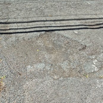 Sunrise Asphalt Services - The front entrance had a small pothole developing. - Masonry/Concrete Near Me - Waialua, Hawaii Sunrise Asphalt Services - The front entrance had a small pothole developing. - Masonry/Concrete Near Me - Waialua, Hawaii