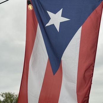Puerto Kokí SA - a large puerto rican flag on a pole - Puerto Rican Near Me - San Antonio, Texas Puerto Kokí SA - a large puerto rican flag on a pole - Puerto Rican Near Me - San Antonio, Texas