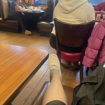 Dengeos - I have to keep my leg up because it does not bend and I have it hanging off the edge so I don't put my foot on the booth seat. - Greek Near Me - Buffalo Grove, Illinois