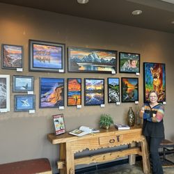 AntoLin Cellars - Artist Leslie Yamada with her paintings in the tasting room.