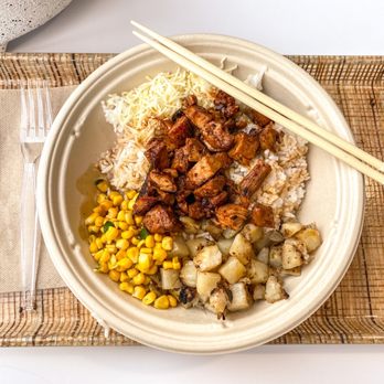 BIBIBOP Asian Grill - Spicy chicken over rice with potatoes, cheese and corn. - Asian Fusion Near Me - Toledo, Ohio BIBIBOP Asian Grill - Spicy chicken over rice with potatoes, cheese and corn. - Asian Fusion Near Me - Toledo, Ohio