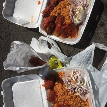 Jollof Land - Jollof Rice w Chicken and Fried Plantains - African Near Me - Austin, Texas Jollof Land - Jollof Rice w Chicken and Fried Plantains - African Near Me - Austin, Texas
