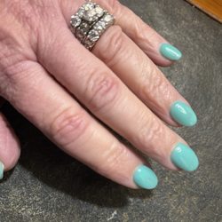 Nails on 20th - Dipped "343" color. Almond shaped tips.