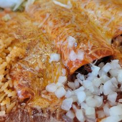 Taqueria Jalisco Mexican Grill - 3 enchilada red sauce platter. Cheese, ground beef or shredded chicken. Got one of each