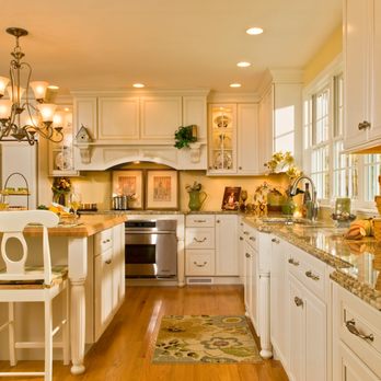 Kitchen & Bath World - a large kitchen with white cabinets and marble countertops - Kitchen & Bath Near Me - Albany, New York Kitchen & Bath World - a large kitchen with white cabinets and marble countertops - Kitchen & Bath Near Me - Albany, New York