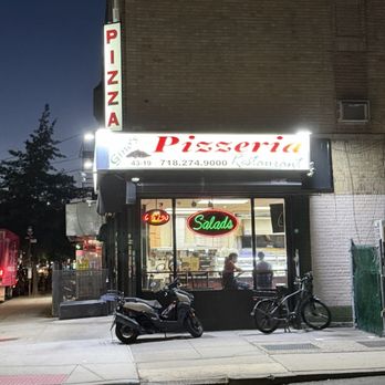 Gino's Pizzeria - Storefront - Pizza Near Me - Astoria, New York Gino's Pizzeria - Storefront - Pizza Near Me - Astoria, New York