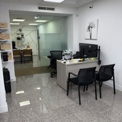 Indian Visa Passport Center - Clean and organized office.