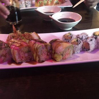 Sakura IX - Hawaii roll and the smaller avocado salmon roll. - Japanese Near Me - Roanoke, Virginia Sakura IX - Hawaii roll and the smaller avocado salmon roll. - Japanese Near Me - Roanoke, Virginia