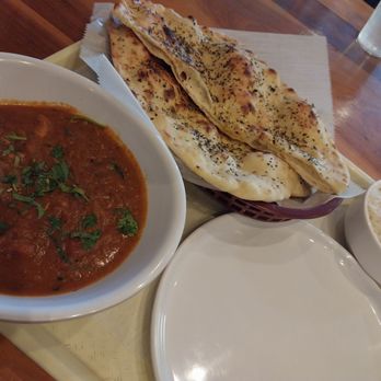 Rajput Indian Eats - Curry chicken, naan, and plastic on plastic. - Indian Near Me - Chesapeake, Virginia Rajput Indian Eats - Curry chicken, naan, and plastic on plastic. - Indian Near Me - Chesapeake, Virginia
