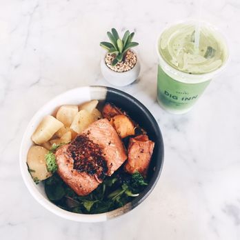 Dig Inn - A bowl of golden beets, greens, salmon, and sweet potatoes, won a matcha iced latte - New American Near Me - Boston, Massachusetts Dig Inn - A bowl of golden beets, greens, salmon, and sweet potatoes, won a matcha iced latte - New American Near Me - Boston, Massachusetts